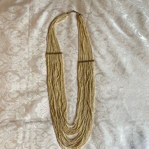 Cream and gold beaded necklace